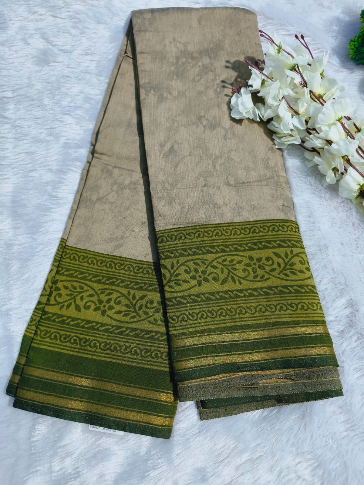 green and beige color weaving traditional saree